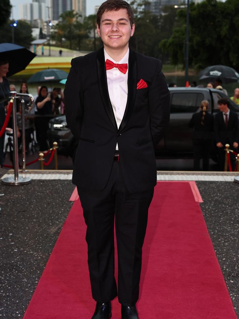 Students arrive for Robina State High formal at HOTA. Alexavier Stromer arrives by bike. Picture: Glenn Hampson.