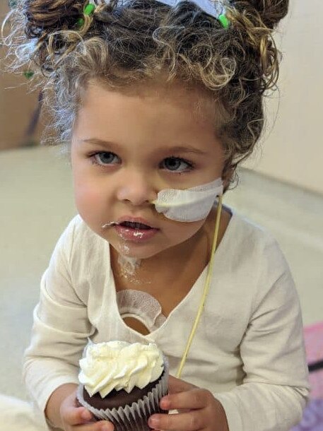 Rosie enjoying a well-earned birthday cupcake. Photo: Supplied