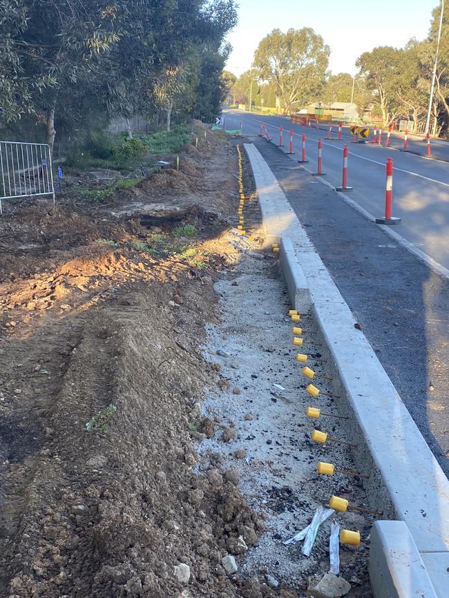 Construction work on dedicated bus bays on Golden Grove Rd, which will be redundant as the bus stops are planned to be abolished under State Government overhaul of public transport.