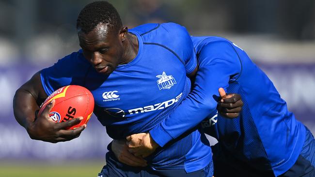 The Roos want injured players, like Majak Daw, to be part of the hub. Picture: Getty Images