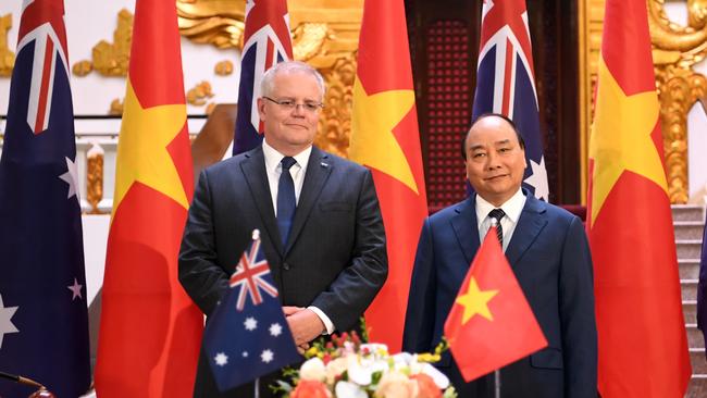 Prime Minister Scott Morrison and Prime Minister of Vietnam Nguyen Xuan Phuc at the Presidential Palace in Hanoi, Vietnam. Picture: AAP Image/Lukas Coch