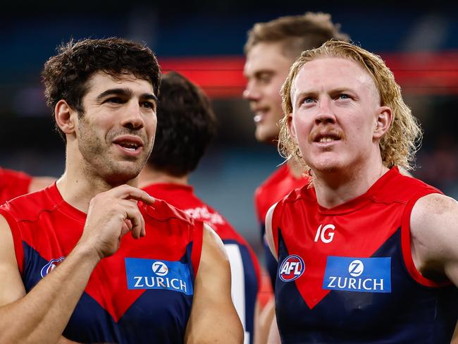 MELBOURNE, AUSTRALIA - APRIL 29: Clayton Oliver and Christian Petracca of the Demons are seen during the 2023 AFL Round 07 match between the Melbourne Demons and the North Melbourne Kangaroos at the Melbourne Cricket Ground on April 29, 2023 in Melbourne, Australia. (Photo by Dylan Burns/AFL Photos via Getty Images)