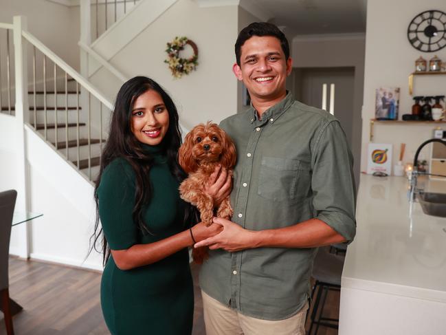 Kellyville homeowners Uma and Vidura Liyanage, with their dog Missy, says rate rises are affecting their decisions and those of their friends. Picture: Justin Lloyd