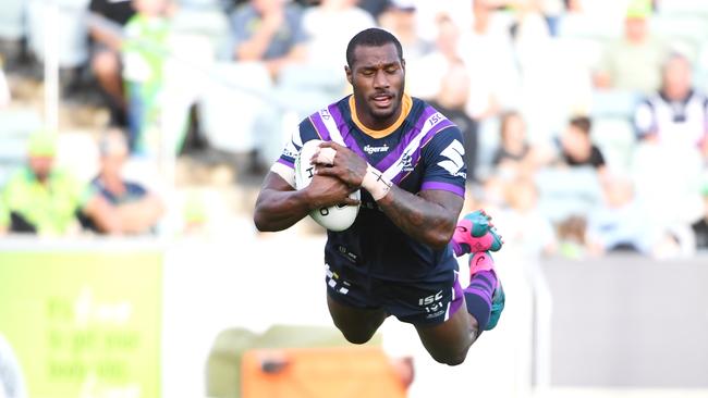 CANBERRA, AUSTRALIA - MARCH 22: Suliasi Vunivalu of the Storm flys through the air as he scores a try during the round two NRL match between the Canberra Raiders and the Melbourne Storm at GIO Stadium on March 22, 2019 in Canberra, Australia. (Photo by Tracey Nearmy/Getty Images)