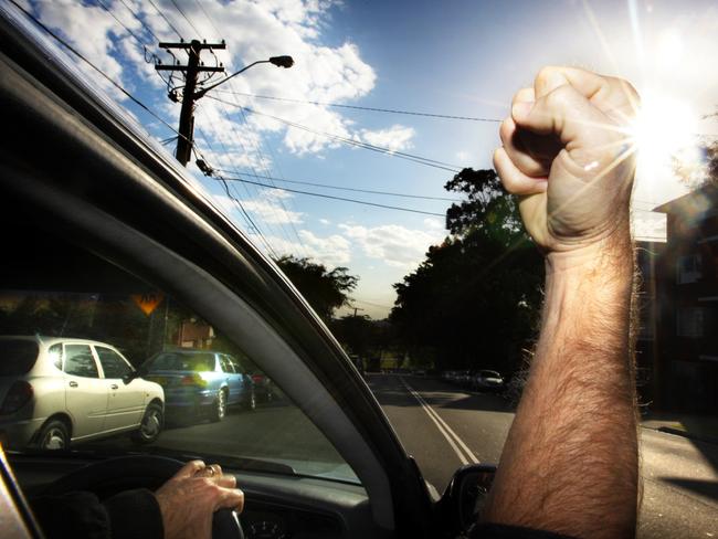 11/08/2009 NEWS: Generic pic of a motorist inside his car as he shakes his fist at passing vehicles. Pic. Craig Greenhill