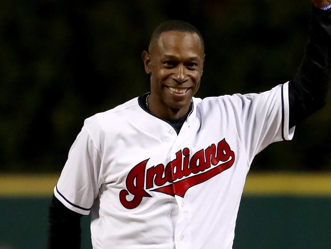 CLEVELAND, OH - OCTOBER 25: Former Cleveland Indians outfielder Kenny Lofton reacts prior to throwing out the first pitch prior to Game One of the 2016 World Series against the Chicago Cubs at Progressive Field on October 25, 2016 in Cleveland, Ohio. (Photo by Elsa/Getty Images)