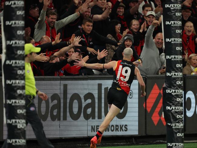 Nick Hind celebrates with the Essendon faithful. Picture: Robert Cianflone/Getty Images