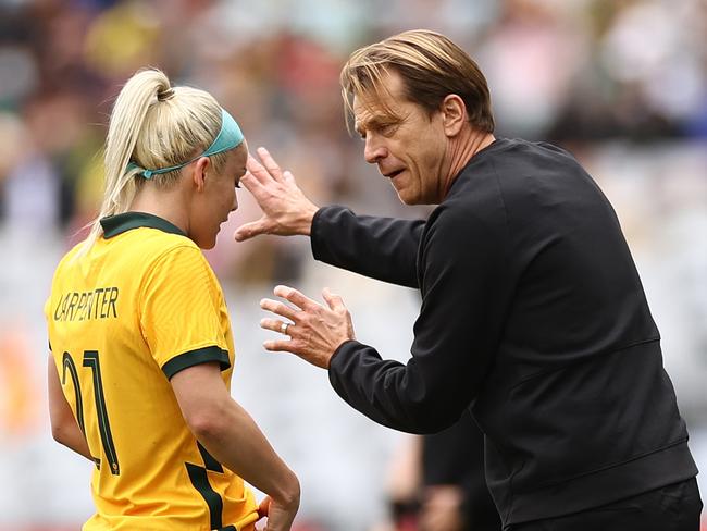 SYDNEY, AUSTRALIA - NOVEMBER 27: Matildas head coach Tony Gustavsson speaks with Ellie Carpenter of the Matildas during game one of the series International Friendly series between the Australia Matildas and the United States of America Women's National Team at Stadium Australia on November 27, 2021 in Sydney, Australia. (Photo by Cameron Spencer/Getty Images)