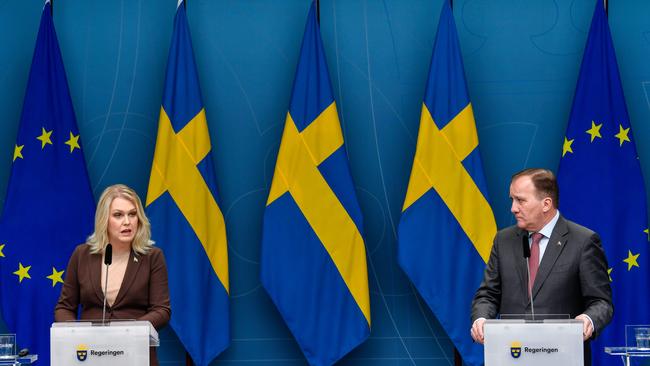 Sweden's Minister for Health Lena Hallengren (L) and Prime Minister Stefan Lofven give a press conference on the new restrictions to curb the spread of Covid-19, in Stockholm on November 11, 2020.