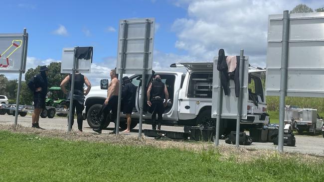 The divers get ready to return to the water at Kinchant Dam.