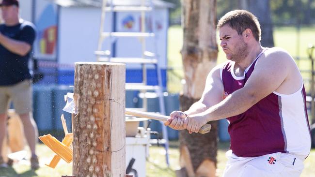 Tom Wilkinson from Kippa-Ring in action in the woodchop arena at the 2019 Redcliffe Show. PHOTO: AAP /Renae Droop