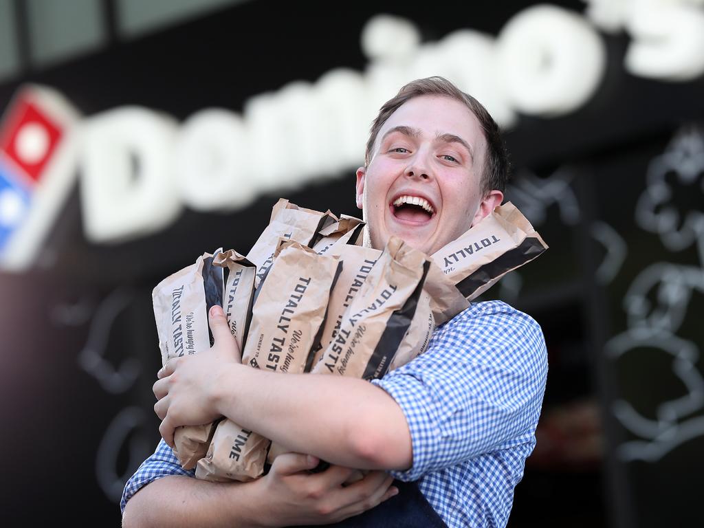 Zach Gracie, 21, from Brisbane has beaten 7500 people to become Domino's first chief garlic bread taste tester. Picture: Peter Wallis