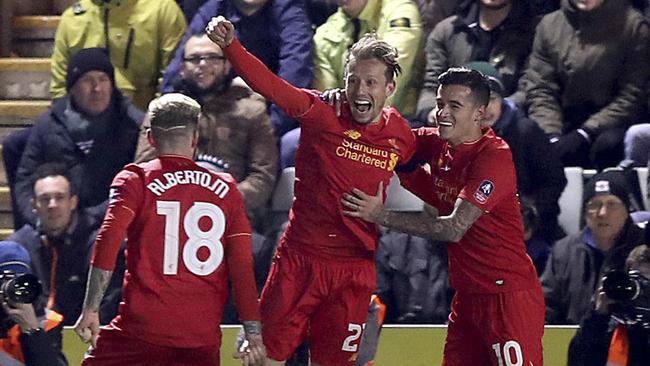 Liverpool's Lucas Leiva, center, celebrates scoring against Plymouth Argyle.