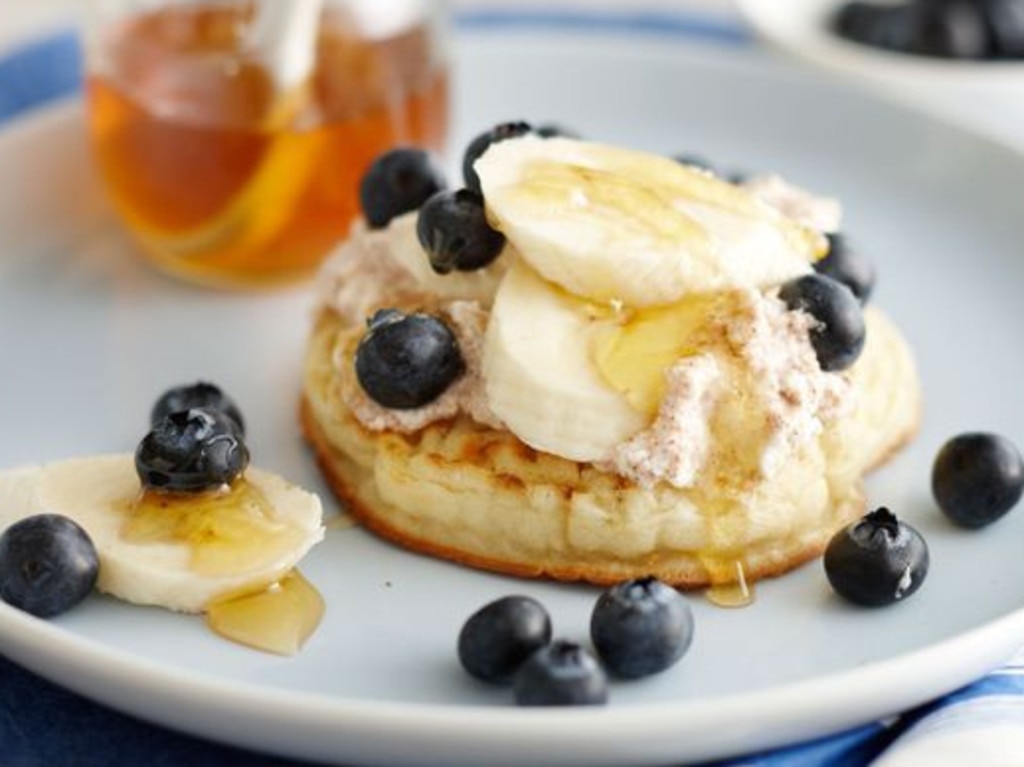 Crumpets with cinnamon ricotta, banana, blueberries and honey.