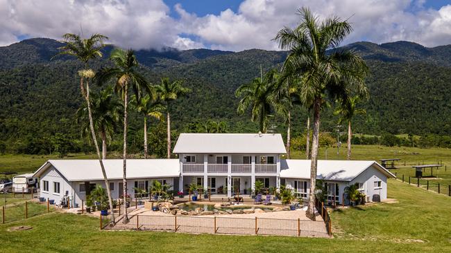 This six bedroom property on 13.86ha at 141 Telecom Rd, Bellenden Ker has a perfect set up for equestrians with 20 horse shelters, three indoor stables and an Olympic size dressage arena. Picture: supplied