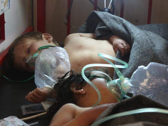 Syrian children are treated at a small hospital in the town of Maaret al-Noman following a suspected toxic gas attack in Khan Sheikhun. Picture: AFP/Mohamed al-Bakour