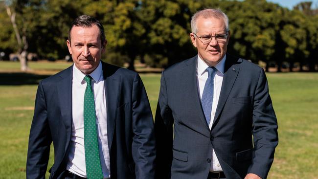 WA Premier Mark McGowan (left) and Prime Minister Scott Morrison are seen arriving for a press conference in Perth, Thursday, March 17, 2022. (AAP Image/Richard Wainwright)