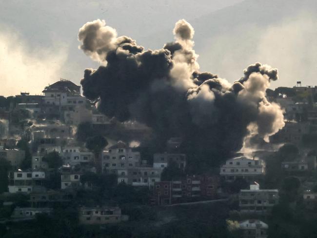 TOPSHOT - Smoke rises from the site of an Israeli air strike that targeted the southern Lebanese village of Khiam on October 9, 2024. Israel expanded operations in Lebanon nearly a year after Hezbollah began exchanging fire in support of its ally, Hamas, following the Palestinian group's deadly attack on Israel on October 7, 2023. (Photo by AFP)