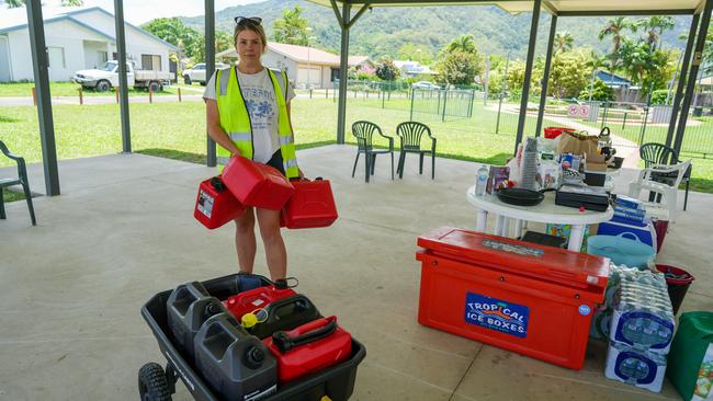 Flood volunteer Renae Amadio has helped organise essential items, including fuel, for residents of Kamerunga Villas. Picture: Nuno Avendano