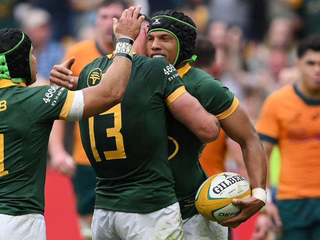 Kurt-Lee Arendse celebrates his try with Springboks teammates. Picture: Getty Images