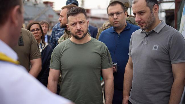 Volodymyr Zelenskyy talking and the Minister of Infrastructure during a visit to Black Sea port of Chornomorsk. Picture: AFP