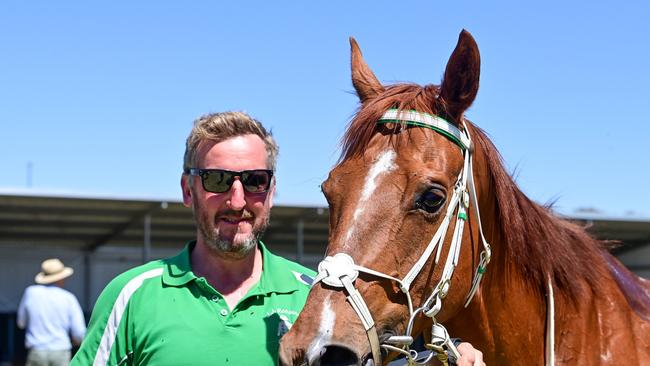 Trainer Jarrod Robinson with Mangwanani after winning the 1800m Maiden Plate at Wycheproof.