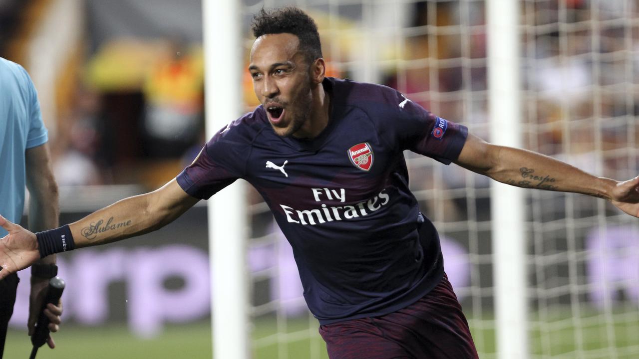 Arsenal forward Pierre-Emerick Aubameyang celebrates after scoring his side's third goal