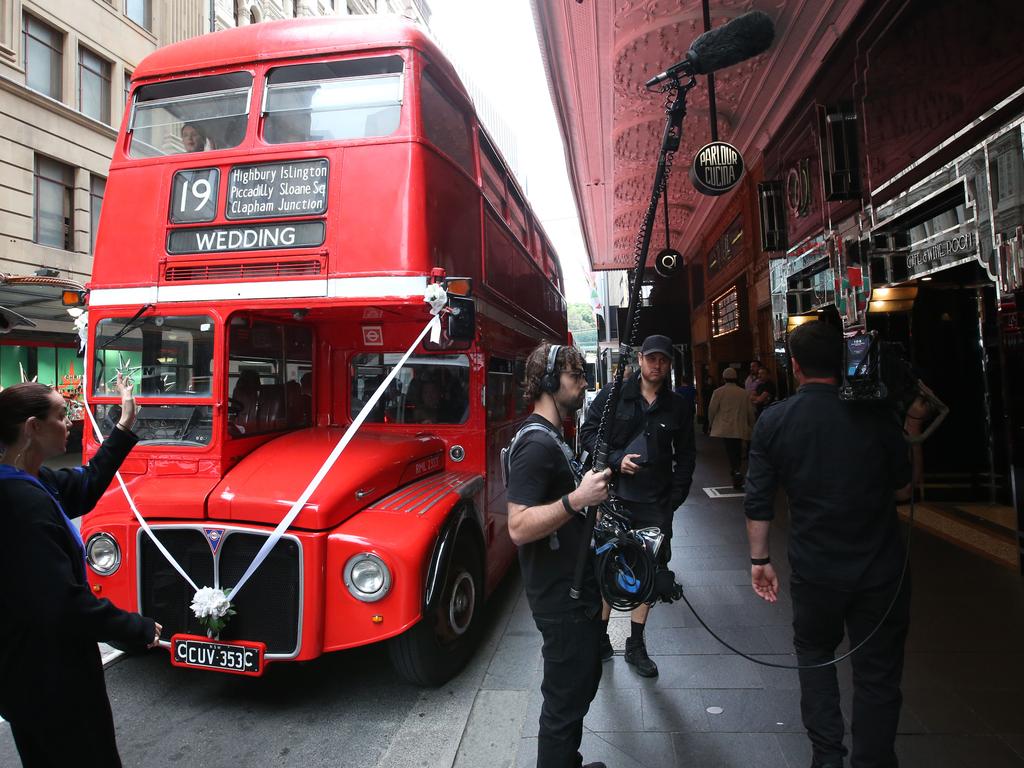 Guests of the Jules and Cam were taken to the wedding venue in a bus. Picture: Damian Shaw