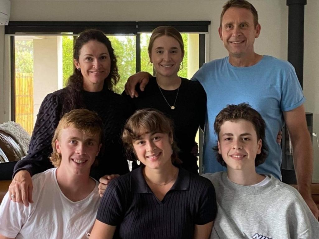 Former Geelong player Paul Brown with, from top left, Angela, Meg, Paul, and bottom from left, Tom, Millie and Harry. Picture: Supplied