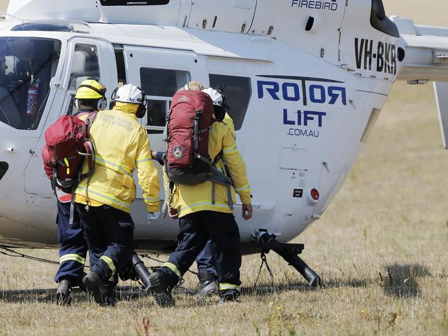 Helicopters and crew coming and going from the Fenton Forest base camp at Glenora. Picture: MATHEW FARRELL