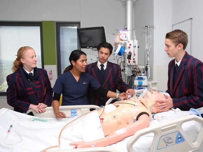 Royal North Shore ICU nurse Kabita Shadha with Barker College students (left to right) Lucinda Allen, Joshua Sneddon and Kai Denton