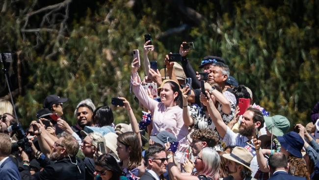Members of the public try to catch a glimpse of King Charles III and Queen Camilla at the Australian War Memorial on October 21, 2024 in Canberra, Australia. Picture: Brook Mitchell/Getty Images