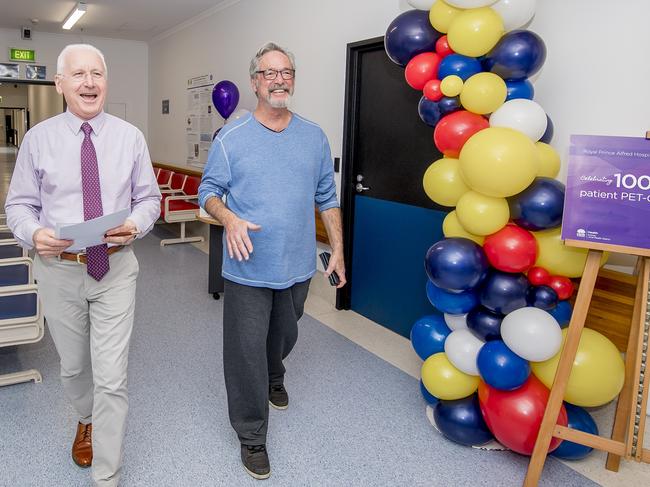 Professor Michael Fulham and the recipient of the 100,000th patient scan, Peter Nemes.