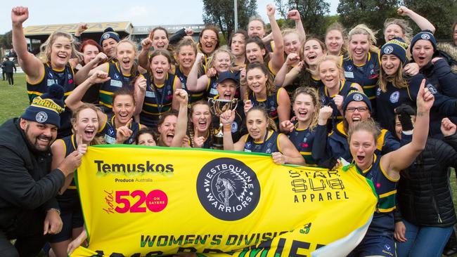 Westbourne Grammarians enjoy the flag winning feeling  Picture: VAFA media