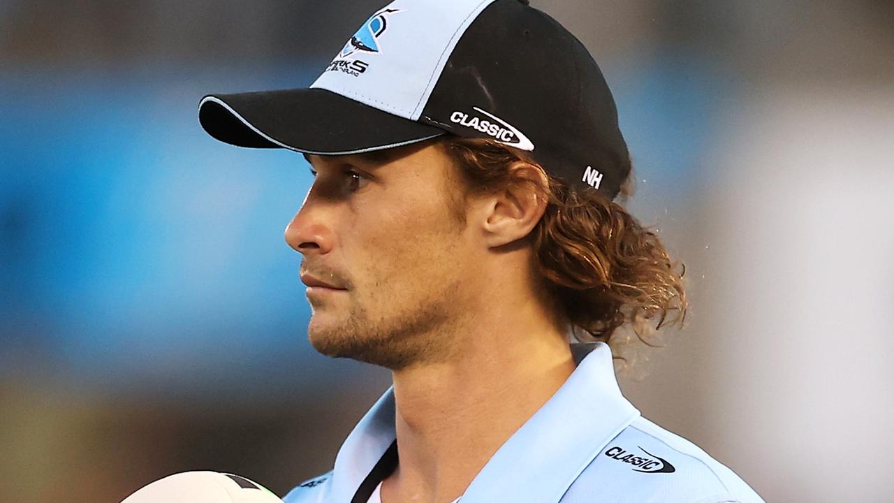 PENRITH, AUSTRALIA - MARCH 04: Injured Sharks player Nicho Hynes watches on during the warm-up before during the round one NRL match between Cronulla Sharks and South Sydney Rabbitohs at BlueBet Stadium on March 04, 2023 in Cronulla, Australia. (Photo by Mark Kolbe/Getty Images)