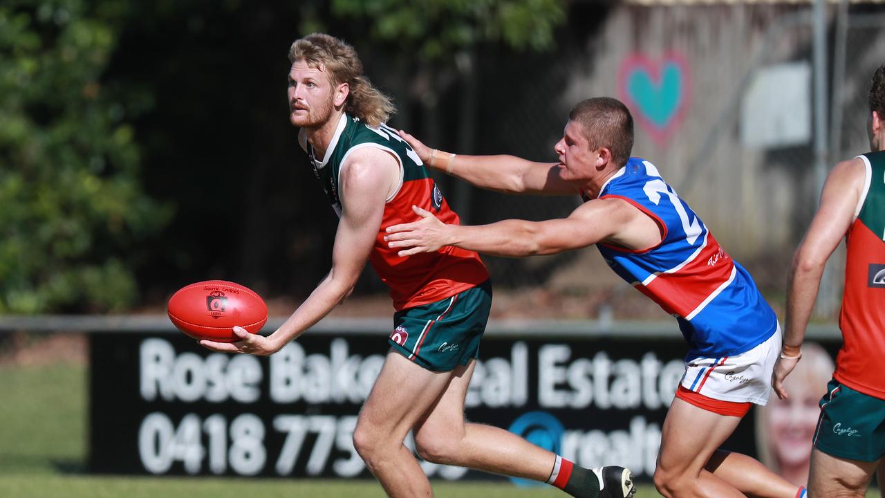 Cutters' Jaise Coleman offloads in the AFL Cairns Premiership Men's match between the South Cairns Cutters and Centrals Trinity Beach Bulldogs, held at Fretwell Park. Picture: Brendan Radke