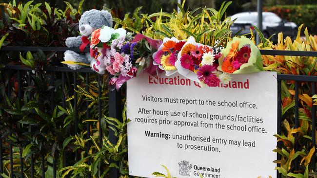 Members of the public have laid flowers and left teddies at Hambledon State School, Edmonton, following the tragic death of a boy, 3, left in a minibus. PICTURE: BRENDAN RADKE