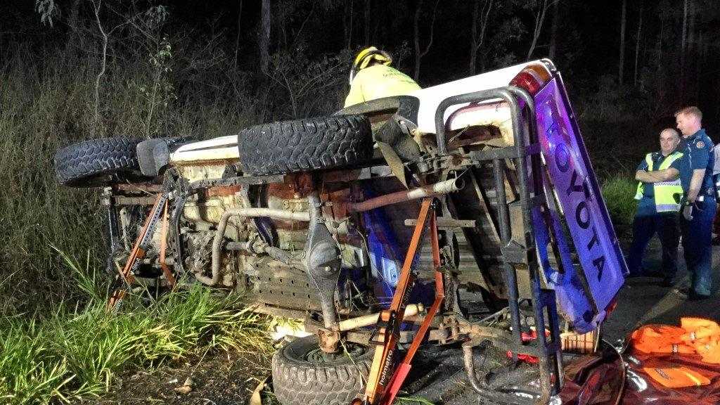 CAR ROLLOVER: Scene from the serious crash at Beerburrum overnight where a teenage driver was trapped behind the wheel. Picture: Queensland Police Service