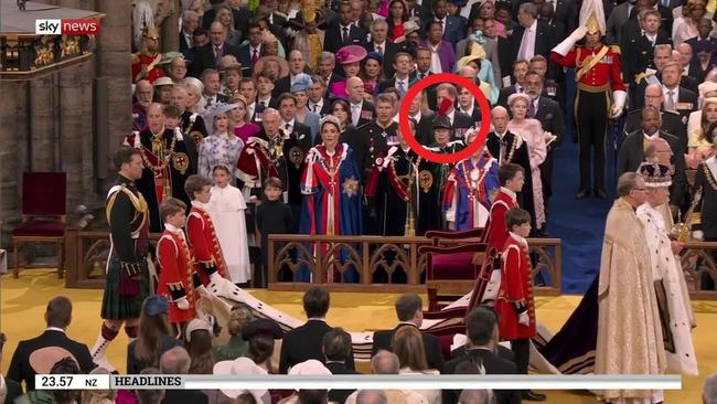 Prince Harry blocked by Princess Anne's feather hat at King Charles’ Coronation. Picture: Sky News