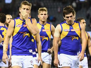 MELBOURNE, AUSTRALIA - AUGUST 06:  The Eagles look dejected after losing the round 20 AFL match between the St Kilda Saints and the West Coast Eagles at Etihad Stadium on August 6, 2017 in Melbourne, Australia.  (Photo by Quinn Rooney/Getty Images)