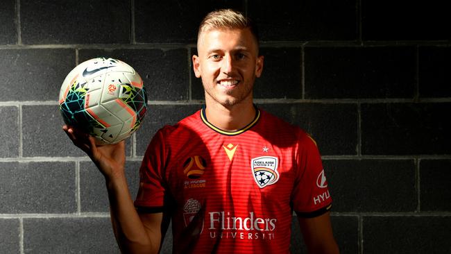 SA-born Stefan Mauk has rejoined Adelaide United, four years after his initial arrival at the Reds. Picture: AAP Image/David Mariuz