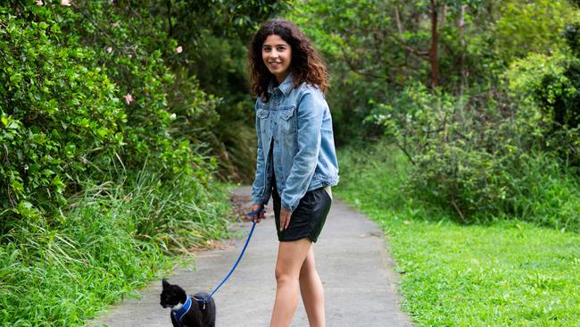 Pet owners like Brianna Kazzi walking her cat Salvador in Gladesville, NSW, is set to become a common sight in Campbelltown. Picture: AAP/Jordan Shields