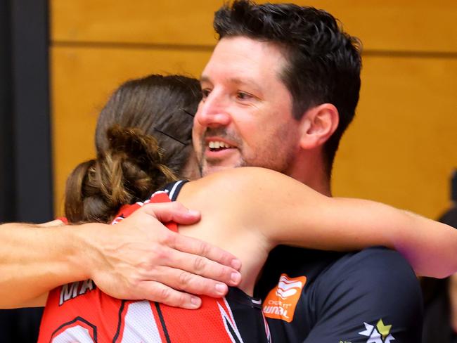 Ryan Petrik and Anneli Maley embrace following their semi final series win over Townsville. Picture: Getty Images