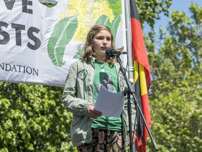 Gracie Kuylaars, 12, addresses the rally at Parliament House Lawns in Hobart. Picture: Caroline Tan