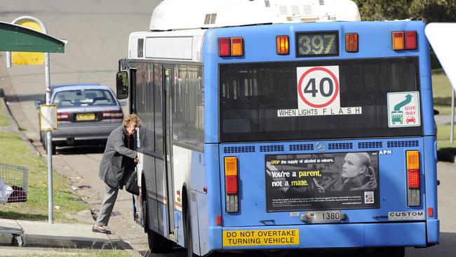 A bus servicing South Maroubra picks up an elderly passenger.