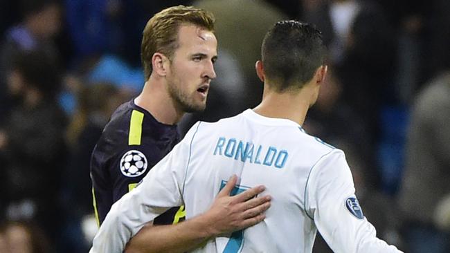 Tottenham Hotspur's English striker Harry Kane (L) greets Real Madrid's Portuguese forward Cristiano Ronaldo.