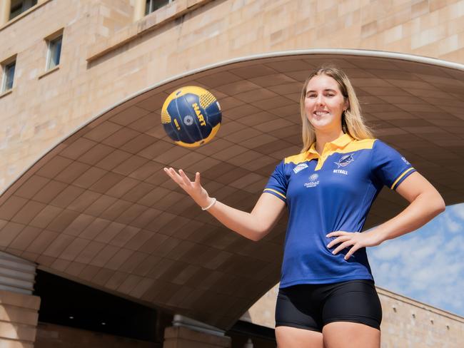 Mia Stower signs with the Bond University Bull Sharks for the 2024 HART Sapphire Series