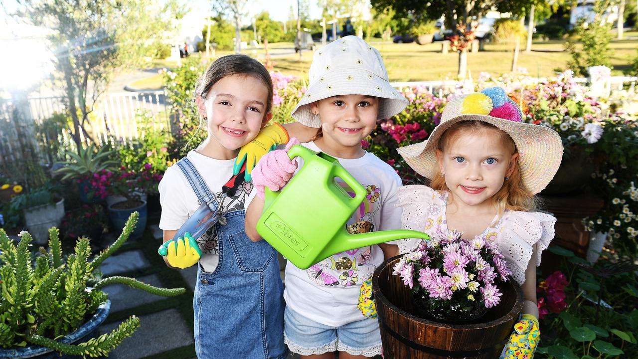 Lylah Schmitt, 8, Lucy Clasie, 8, and Penelope Townsend, 6, are entering in the Floriculture junior section at this year's Townsville Show. Picture: Shae Beplate.