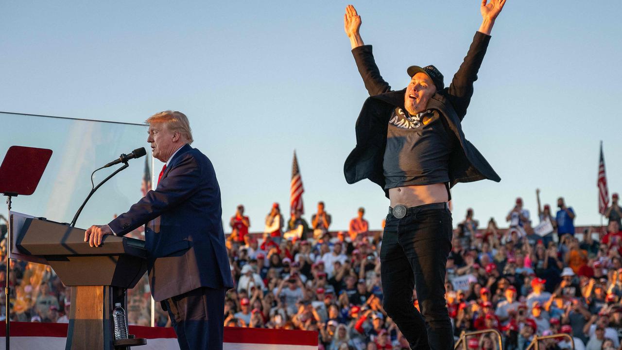 Mr Musk rather enjoying his time on stage at a Trump rally. Picture: Jim Watson/AFP