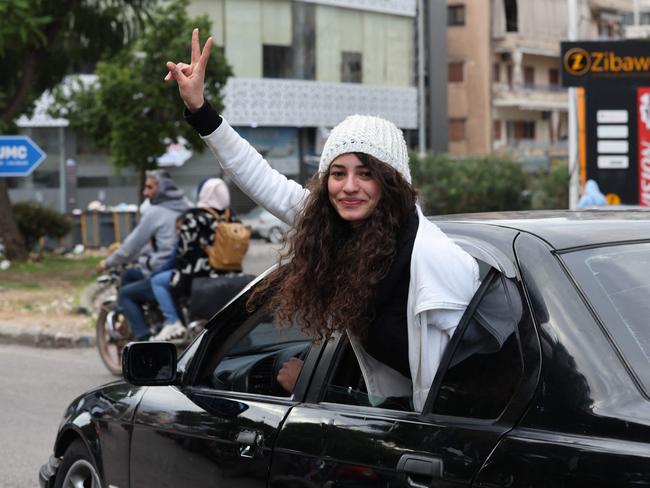 A Lebanese girl gestures in the southern Lebanese city of Sidon after a ceasefire between Israel and Hezbollah took effect. Picture: AFP